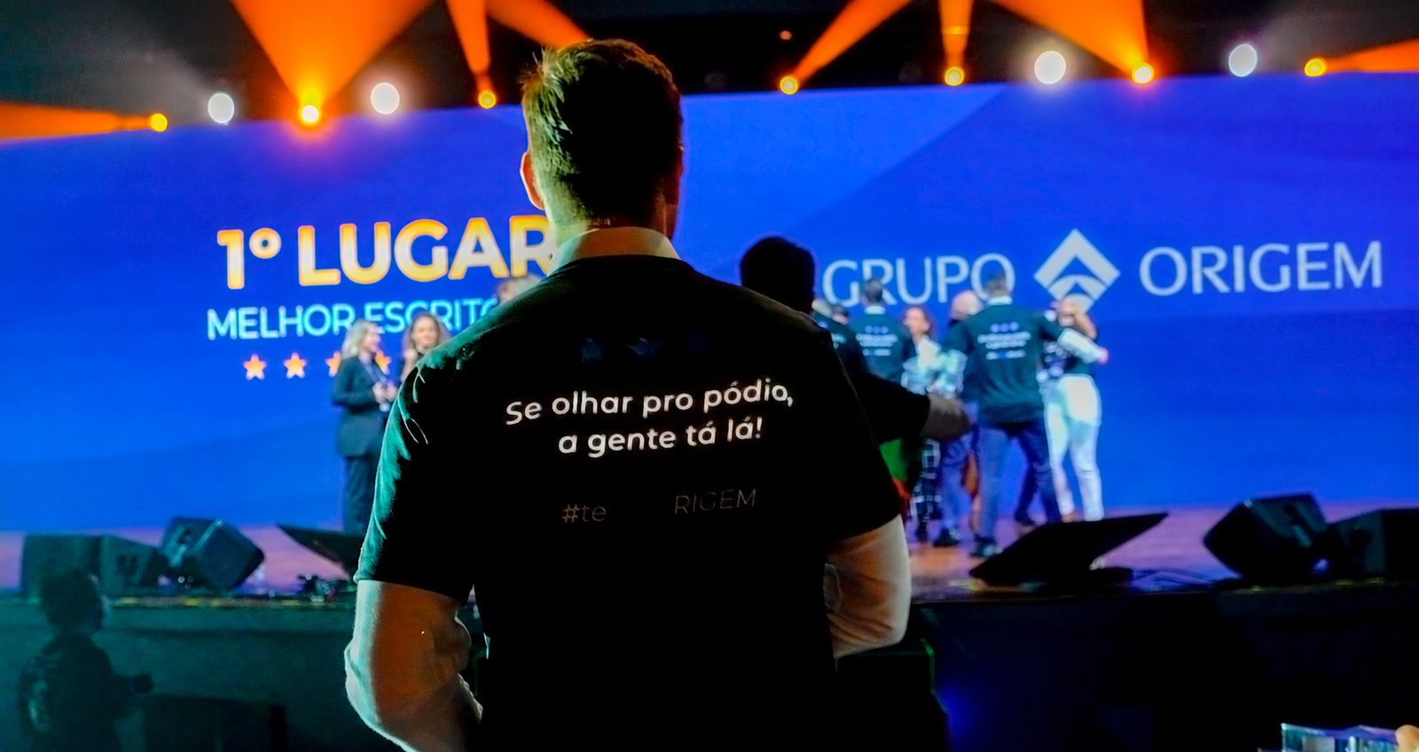 Time do Grupo Origem no palco do Safra Invest Awards